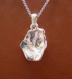 Please read. The following information should answer all your questions about this pendant. Breed-specific jewelry is a novel way to show off your favorite dog breed, it also makes a great present for the dog lovers on your gift list. In my many years of making and selling breed-specific jewelry I have heard more times that I can count that, I becomes the wearers favorite piece of jewelry. My pendants are made with a very high-quality solid sterling silver. I put a satin finish on the breed stud Elegant Silver Nugget Necklace, Nugget-shaped Polished Jewelry As Gift, Elegant Sterling Silver Nugget Jewelry, Sterling Silver Nugget Jewelry With Polished Finish, Luxury Nugget-shaped Jewelry For Gifts, Luxury Nugget-shaped Jewelry Gift, Head Study, Norwich Terrier, Long Haired Dachshund