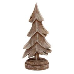 a small wooden christmas tree on a white background