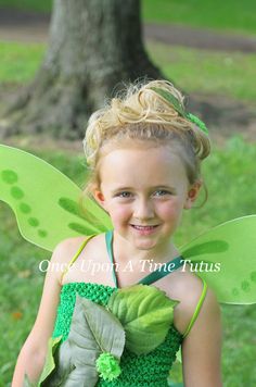 "Green Garden Fairy Tutu Dress An unlined green crochet top is 8 inches long and is embellished with leaves and flowers, shades of green tulle, and topped off with a satin ribbon halter tie. If a lined top is desired, the upgrade can be added here: https://www.etsy.com/listing/198578001/upgrade-to-lined-top?ga_search_query=lined%2Bto&ref=shop_items_search_3&frs=1 For a perfect fit, please measure around the broadest part of your child's chest. The length measurement I use for sizing is f Green Fairycore Dress For Spring, Spring Green Fairycore Dress, Green Fairy Dress For Dress-up, Green Fairycore Dress For Summer, Green Fairy Dress For Spring Dress-up, Princess Style Green Fairy Dress For Spring, Spring Princess Style Green Fairy Dress, Whimsical Spring Green Fairy Dress, Green Fairy Dress For Summer