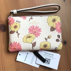 Price Firm Printed Coated Canvas And Smooth Leather Two Credit Card Slots Zip-Top Closure, Fabric Lining Wrist Strap Attached 6 1/4" (L) X 4" (H) X 1/2" (W) Style No. Ch647 Spring Zipper Pouch Wristlet Clutch, Trendy White Clutch, Spring Coach Wristlet For Everyday Use, Coach Spring Wristlet For Everyday, White Wristlet For Daily Use In Spring, White Rectangular Clutch For Spring, Spring Wristlet With Wrist Strap For Everyday Use, Spring Rectangular Wristlet With Wrist Strap, Spring Rectangular Wristlet