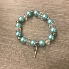 Beaded Bracelet. Never Worn. Cross Charm (See Picture). Bracelet Stretches To Accommodate Most Wrist Sizes. *Nwt *Smoke-Free Home *Bundle With Other Items To Save On Shipping! Picture Bracelet, Silver Beaded Bracelet, Cross Charms, See Picture, Blue And Silver, Beaded Bracelet, Color Blue, Beaded Bracelets, Bracelet