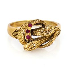 Vintage 9k Gold Double Head Snake Ring, Ruby Dual Serpent in Annular Position 9ct Yellow Gold Ring. Reptile Vintage Gold and Ruby Ring. This beautiful Victorian ring is an excellent example of goldsmith work during this period. Superb jewellery was crafted during Victorian/Edwardian times, displaying a beautiful, timeless design and craftsmanship. The ring is hallmarked for 9ct gold. This beautiful old ring style is from 1900 century , it is in lovely condition. The beautiful band and setting is Antique Hallmarked Snake Ring, Vintage 14k Gold Snake Ring, Vintage Yellow Gold Snake Ring As Gift, Antique Gold Snake Ring For Formal Occasions, Vintage 14k Gold Snake Ring As A Gift, Vintage Gold Snake Ring For Anniversary, Gold Vintage Snake Ring For Anniversary, Vintage 14k Yellow Gold Snake Ring, 14k Gold Hallmarked Snake Ring For Anniversary