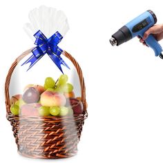 a basket filled with lots of fruit next to a blow dryer