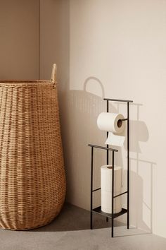 The Dora collection is comprised of freestanding pieces designed to provide practical storage solutions while complementing any décor aesthetic. Minimalist, slim, and practical, the Dora Toilet Paper Stand allows for varied storage with two small towel bars, an easy-refill toilet paper bar, and a low shelf. The powder-coated metal of the simple frame is finished to resist rust and withstand damp conditions, making it the perfect addition to bathrooms and laundry rooms. Details Made In: Denmark M Tall Laundry Basket, Toilet Paper Stand, Design Online Shop, Danish Furniture Design, Clothes Stand, Paper Stand, Large Armchair, Small Towel, Handcrafted Bags