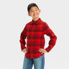 Add timeless style to your child's wardrobe with this Long-Sleeve Flannel Button-Down Shirt from Cat & Jack™. Made from 100% cotton, this lightweight flannel shirt is adorned with a checkered pattern. With a collared neck, full-length button-down placket, chest patch pocket and long sleeves with buttoned cuffs, this regular-fit shirt infuses smart vibes into your ensemble. Plus, the below-waist length and shirttail hem make it great to wear tucked, untucked and layered with pants, shorts, leggin Casual Red Flannel Shirt With Buttons, Red Cotton Flannel Shirt For Fall, Classic Red Flannel Tops, Red Cotton Shirt For Fall, Red Cotton Flannel Long Sleeve Shirt, Red Cotton Long Sleeve Flannel Shirt, Red Long Sleeve Cotton Flannel Shirt, Flannel Tops, Kids Clothes Boys