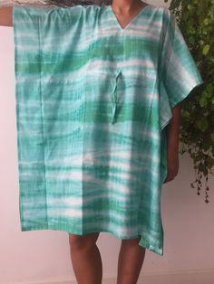 This Item is handmade. We use organic top quality cotton to ensure your skin is pampered and always natural. These are made with light weight fresh cotton fabric so it can dry extremely fast on you beach/pool day and keep you cool. The design is multi functional depending on your mood, Use it like a kaftan to lounge around the house in or even as a swim cover up for your day at the beach or pool. Washing Care: Hand wash for the first wash,Following which a gentle cycle in the machine. Long Kaftan For Poolside And Beachwear, Short Sleeve Relaxed Fit Tunic For Beach, Relaxed Fit Short Sleeve Tunic For Beach, Free Size Beachwear Kaftan For Beach Season, Oversized Short Sleeve Kaftan For Summer, Free Size Beachwear Kaftan For The Beach, Cotton Tunic For Beach Cover-up With Short Sleeves, Summer Beach Cover-up Kaftan With Kimono Sleeves, Blue Summer Kaftan For Loungewear