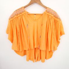 Free People Top Size Small Orange Embroidered Flowy Boho Bohemian V Neck Carrot Nwt Condition: Nwt (New With Tags) Size: Small We Are Happy To Answer Your Questions! Elevate Your Style With This Delightful Orange Embroidered Flowy Boho V-Neck Top By Free People In Size Small. Super Fast Shipping: We Ship Out The Next Business Day! Summer Embroidered V-neck Peasant Top, Orange V-neck Top For Festivals, Summer Hippie V-neck Peasant Top, Hippie V-neck Peasant Top For Summer, Bohemian V-neck Embroidered Top, Summer Festival Peasant Top With V-neck, Summer Festival V-neck Peasant Top, Orange Embroidered Beach Top, Orange Embroidered V-neck Top