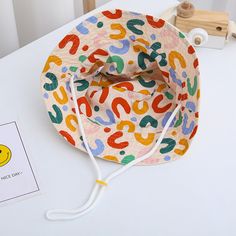 Keep Your Little One Stylish and Protected with Our Double-Sided Cotton Bucket Hat Introducing the perfect summer accessory for your child – the Solid Letter Print Kids Bucket Hat. Made from high-quality cotton, this double-sided cap is designed to keep your baby cool, comfortable, and protected from the sun. With its cute letter embroidery and versatile design, it’s the ideal hat for all your outdoor adventures. Product Features Our bucket hat is crafted with care and attention to detail, ensur Fashion Trend Pattern, Pet Water Bowl, Kids Bucket Hat, Outdoor Sun Shade, Baby Sun Hat, Cute Letters, Shining Star, Kids Hats, Summer Accessories