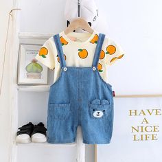 2pcs Fashion Bear Cartoon Print T-shirt and Jumpsuits - PrettyKid Trendy Cotton Overalls With Short Sleeves, Cute Summer Sets With Pockets, Trendy Cotton Sets With Cartoon Print, Cute Spring Sets With Pockets, Playful Summer Sets With Pockets, Casual Denim Sets For Summer, Cute Denim Overalls For Summer, Cute Summer Overalls With Pockets, Cute Denim Tops For Summer