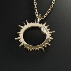 Also available without diamonds and sterling silver﻿. Solar eclipse corona jewelry Introducing the eclipse collection to commemorate the total solar eclipse of 2024. Featuring the solar corona and the "diamond ring" effect. About this piece This pendant necklace is made of 14K solid gold and marquise-cut diamonds. The charm is available in two sizes: 5/8" (16mm) and 7/8" (23mm). The necklace comes with a 16-18" length adjustable gold chain (other lengths available). Optional complementary engrav Solid Gold Charms, Space Jewelry, Total Solar Eclipse, The Eclipse, Marquise Cut Diamond, Small Charms, Solar Eclipse, Marquise Cut, Gold Charm