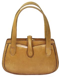 This is an early Gucci leather tan handbag from the 1940's or earlier, with a fabric label in the interior that says: Gucci Firenze V.Vigna Nuova Roma V. Condotti The estate sale representative relayed that the handles appeared to have been replaced at some point in time. Measures 7" height x 10 1/2" length x 2" depth. The strap drop is 6". The purse is in very good vintage condition with some scuffs and marks (see photos). The clasp works. Free domestic shipping with careful packaging, shipping Gucci Satchel For Shopping, Gucci Rectangular Satchel For Shopping, Gucci Double Handle Satchel For Daily Use, Gucci Handheld Shoulder Bag For Everyday Use, Everyday Handheld Gucci Satchel, Rectangular Gucci Satchel For Evening, Gucci Rectangular Satchel For Evening, Gucci Satchel With Leather Lining For Travel, Gucci Rectangular Evening Satchel