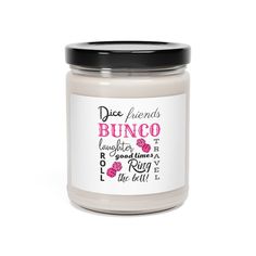 a white jar filled with pink flowers and the words, dice friends, bunco