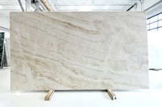 a large white marble slab in a warehouse