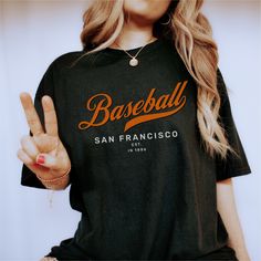 Elevate your game day style with our San Francisco baseball design on a Comfort Colors shirt. Show your love for the City by the Bay and your favorite baseball team with this ultra-comfortable, vintage-inspired tee. Crafted from the softest, pre-shrunk cotton, this shirt is perfect for cheering on your team. More About This Shirt: The double-needle stitching throughout the tee makes it highly durable while the lack of side-seams helps the shirt retain its tubular shape and stay comfortable. Plea Baseball Design, Gifts Vintage, Baseball Gifts, Comfort Colors Shirt, Baseball Shirt, Oversized Style, Baseball Team, Baseball Shirts, Gilmore Girls