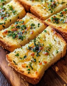 slices of garlic bread on a cutting board