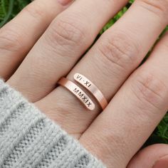 "This wrap ring is hand crafted just for you. Special initials, names, a date, or even your favorite place, you name it...I'll stamp it. (Limit of 12 characters per line). The Details *Handcrafted using 1/8\" width aluminum, brass, copper, or sterling silver The Process Hand stamping is a very different process than traditional engraving. Hand stamping is done entirely by hand, with a hammer and steel stamp. The stamps have letters or designs carved on the end and each is individually stamped into the metal with a hammer. Every item is carefully handcrafted, so certain variations are to be expected. This adds to the one of a kind nature and overall quality of each piece I create. Please refer to shop announcement for current production time (this does not include shipping time)." Custom Text Rose Gold Jewelry For Anniversary, Adjustable Engraved Rose Gold Ring For Anniversary, Adjustable Rose Gold Engraved Ring For Anniversary, Rose Gold Engraved Ring With Name For Gift, Rose Gold Engraved Name Ring As Gift, Rose Gold Engraved Name Ring For Gift, Customizable Engraved Rose Gold Ring Gift, Personalized Adjustable Rose Gold Midi Rings, Adjustable Personalized Rose Gold Midi Rings