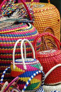 colorful baskets are stacked on top of each other