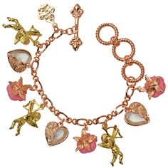 Ritzy Couture Cupids and Romance Pink Adjustable Charm Bracelet - Rose Gold/Gold Nothing whispers "Love" like cupids and arrows. When you're wearing a romantic fashion accessory like this one, get ready for endless compliments and praise from those you love! On this rose gold charm bracelet with goldtone, you’ll find three Cupids, three glass crystal hearts, and three cast resin pink roses for an exceptional and elegant look. Use the adjustable toggle clasp and any of the three rings to find tha Luxury Charm Bracelet For Valentine's Day, Rose Bracelets For Valentine's Day, Rose Color Bracelets For Valentine's Day, Pink Charms Jewelry For Wedding, Romantic Fashion, Rose Gold Charms, Heart Shaped Jewelry, Three Rings, Gold Charm Bracelet