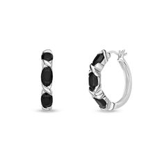 Make a stylish statement with these rich black onyx "Xo" hoop earrings - a clever choice to dress up your chic looks. Crafted in sleek sterling silver Each hoop earring showcases a trio of 6.0 x 4.0mm oval-shaped black onyx alternating with sculpted "X"-shaped details. These earrings secure with latch backs. Silver Prices, Oval Stone, Onyx Stone, Earring Backs, White Metal, Three Stone, Stone Settings, Designer Earrings, Black Onyx