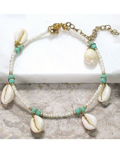 Accent your spring or summer look with this coastal-inspired, cowrie shell anklet from Periwinkle by Barlow that's finished with natural shells that dangle freely and colorful, seed beads.One size fits mostLobster claw clasp with adjustable length Cowrie Shell Anklet, Seed Bead Anklet, Bead Anklet, Hemp Jewelry, Beach Anklets, Paper Store, Beaded Anklets, Cowrie Shell, Seed Bead Necklace