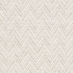 an upholstered white and grey herringle fabric with small chevrons on it