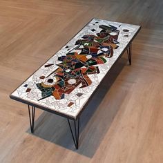 Large (width 121 cm) 1950s coffee table. Mosaic glass top with black metal hairpin legs. Coffee Table Mosaic, Mosaic Table Top Designs, Table Mosaic, Mosaic Coffee Table, Furniture Box, Mosaic Table Top, Mosaic Table, Hairpin Legs, Art Table