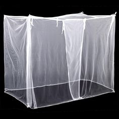 an image of a white tent with mosquito netting on it