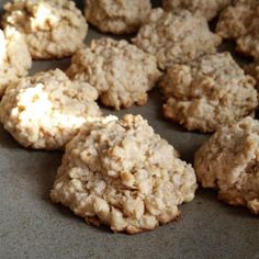 some cookies that are sitting on a counter top with the light coming in from behind them