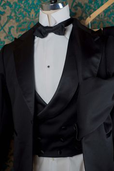 "The pricing on this listing is for a 3pc Handsewn Tux with the muslin fitting. We can make a similar tux in our Decadence '89 style with less handwork for a lower price. 1909 BESPOKE: These are our completely custom handmade suits. Each suit is crafted for an individual customer based on his tastes and lifestyle, and the price of the suit includes us spending 4 hours on designing your suit alone and sketching ideas. These suits are completely patterned, cut, and sewn here in our studio in Denve Black Silk Tuxedo For Evening Events, Black Silk Tuxedo For Evening, Black Silk Tuxedo Suits, Black Silk Suits For Black-tie Events, Semi-formal Fitted Double Breasted Suit With Pressed Crease, Elegant Fitted Double Breasted Suit For Formal Occasions, Fitted Three-piece Suit With Pressed Crease For Semi-formal Occasions, Fitted Three-piece Suit With Pressed Crease For Semi-formal, Luxury Fitted Three-piece Suit