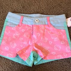 Nwt Cute Multi Colored Hello Kitty Stretch Shorts For Toddler Girl. Size Xs Pink Fitted Kawaii Bottoms, Playful Blue Shorts For School, Pink Stretch Bottoms For Playtime, Cute Spring Shorts For School, Stretch Pink Bottoms For Playtime, Cute Shorts For School In Spring, Cute Fitted Bottoms, Cute Blue Shorts For Playwear, Cute Stretch Blue Shorts