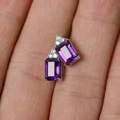 This is a gorgeous handmade creation. Its beauty is its simplicity & Elegance. The 5*7mm emerald cut amethyst is crafted in solid sterling silver and with rhodium plated. Customized is available. Just contact me to tell me your mind. All item is sent in a beautiful gift box You can realize more lovely stuff clicking the link https://www.etsy.com/shop/knightjewelry?refshopsection_shophome_leftnav Please leave the correct address and you phone number for delivering successfully. Sterling Silver Emerald Cut Earrings, Elegant Emerald Cut Purple Jewelry, Sterling Silver Baguette Cut Earrings Gift, Elegant Purple Emerald Cut Jewelry, Emerald Cut Sterling Silver Earrings For Gift, Elegant Sterling Silver Emerald Cut Gemstones, Elegant Emerald Cut Birthstone Gemstones, Classic Emerald Cut Sterling Silver Gemstones, Elegant Emerald-cut Birthstone Gemstones