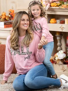 Y'all know what time it is! Share fierce fall vibes with your little girl in matching pullover tops. Soft to the touch and the perfect mix of pink fabric and leopard print graphics. Breathable lightweight fabric that flatters mommy and daughter alike Pairs with your favorite skirts, leggings, and jeans for a cute and casual 'fit Perfect for fall, lounging, pumpkin patches, and harvest time twinning Long-sleeve pullover top with leopard print "It's Fall Y'all" graphic print Available in sizes 2T-10Y for girls; S-XXL for women Mom and girls' sizes are sold separately Family Matching Pink Tops For Fall, Leopard Print Relaxed Fit Top For Fall, Leopard Print Tops With Relaxed Fit For Fall, Leopard Print Top With Relaxed Fit For Fall, Fall Leopard Print Cotton Tops, Leopard Print Cotton Tops For Fall, Fall Leopard Print Top With Letter Details, Fall Leopard Print Tops With Letter Design, Mommy And Daughter