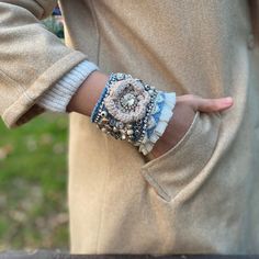 a close up of a person wearing a bracelet