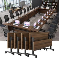 two rows of desks with laptops on them in an office setting, one is empty