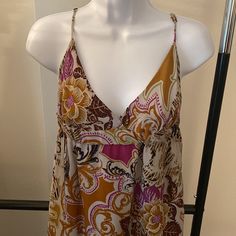 Torn By Ronny Kobo Maxi Dress. Floral Pattern Printed In Browns, Green And Purple. She’ll Is 100% Silk. Fully Lined. Side Zipper. Adjustable Straps. Size Medium. Nwt From Neiman Marcus. Total Length-54”. Purple Floral Print Sleeveless Beach Dress, Purple Floral Print Sleeveless Dress For Beach, Purple Floral Sleeveless Beach Dress, Purple Floral Sleeveless Dress For Beach, Purple Floral Sleeveless Dress For The Beach, Summer Sleeveless Purple Mini Dress, Summer Sleeveless Purple Sundress, Purple Sleeveless Sundress, Sleeveless Purple Summer Dress