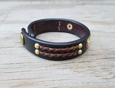 Horse Hair Leather Bracelet with Solid Brass Name Plate & Antique Brass Snap - 5/8" Horsehair Cuff Classic Adjustable Double Band Bracelets, Classic Adjustable Double Band Bracelet, Classic Handmade Adjustable Cuff Bracelet, Handmade Classic Braided Bracelets, Classic Handmade Adjustable Braided Bracelets, Classic Adjustable Handmade Braided Bracelets, Classic Handmade Adjustable Leather Bracelet, Brown Bracelets With Custom Hardware For Gift, Classic Adjustable Braided Bangle Bracelet