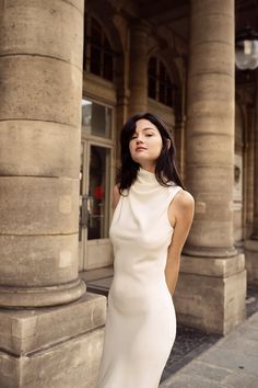 Elegant Beige High Neck Dress, Elegant High Neck Beige Dress, Beige Fitted High Neck Mini Dress, Fitted Beige Mini Dress With High Neck, Fitted Beige High Neck Mini Dress, Chic Beige High Neck Dress, Chic High Neck Beige Dress, Classic Fitted Sleeveless Dress, Sleeveless Fitted Classic Maxi Dress