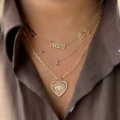 This 14K Gold Hebrew Initial Gemstone Bezel Necklace offers a personalized touch with the option to choose your own gemstone and Hebrew initial. Crafted from high-quality 14k gold, this necklace is sure to add a special touch to any outfit. Show off your faith and style with this stunning necklace. Item Information: Metal: 14k Gold Approx. Weight: 1.50g Letter Size: 6mm Approx. Carat Weight: 0.05 Sparkle Gift, Diamond Evil Eye, Gold Topaz, Bezel Necklace, Nameplate Necklace, Mother Of Pearl Necklace, Initial Jewelry, Diamond Star, Evil Eye Pendant