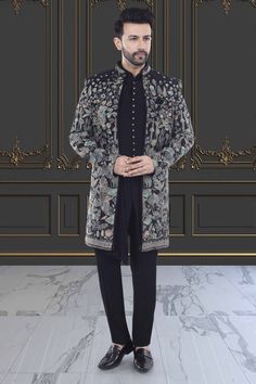 This Mens Sherwani (S2- S369) features colorful floral thread embroidery, giving it an elegant and sophisticated look. The open-jacket design adds a touch of modernity and versatility. Perfect for special occasions, this sherwani is sure to make a statement and elevate your style. Floral Thread Embroidery, Mens Sherwani, Open Jacket, Sophisticated Look, Thread Embroidery, Jacket Design, Elevate Your Style, Your Style, Special Occasion