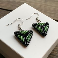 Beaded triangle dangle drop earrings  would look great as a everyday delicate accessories. Also summer green jewelry for woman can be a cool anniversary 21st birthday gift for her. All my jewelry I sent in a minimalist white box. I also use additional packaging that will preserve and protect your purchase at the time of delivery. Thank you for visiting my shop. Beaded Triangle Earrings For Gifts, Triangle Beaded Earrings For Gifts, Handmade Green Triangle Earrings, Handmade Green Triangle Jewelry, Elegant Triangle Beaded Earrings Gift, Elegant Triangle Beaded Earrings For Gift, Elegant Triangular Beaded Earrings For Gift, Minimalist White, Summer Green