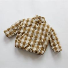 Introducing the Unisex Kids Plaid Padded Jacket, a cozy winter essential for your little ones. This jacket is crafted with a cotton-polyester blend material, ensuring comfort and durability. The single-breasted closure and mandarin collar add a touch of sophistication, while the pockets provide practicality. With its woven plaid pattern and regular fit, this jacket is suitable for boys and girls aged 2–6 years. Keep your kids warm and stylish this winter with this adorable outerwear piece. ❄️🧥 Kids Fall Fashion, Stylish Baby Clothes, Korean Winter, Kids Plaid, Baby Fits, Winter Outerwear, Plaid Coat, Kids Outerwear, Stylish Baby