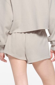 Keep your look laid-back and luxe in casual sweat shorts made from supersoft cotton-blend fleece in a relaxed fit brought to you by Kim Kardashian's SKIMS. 3" inseam; 28" leg opening; 10 1/2" front rise; 16" back rise (size Medium) Elastic waist 70% cotton, 30% polyester Machine wash, tumble dry Imported Hairstyling Products, Led Fashion, Rollerball Perfume, Beauty Sale, Sweat Shorts, Fragrance Design, Fabric Gifts, Free Fabric, Styling Tools