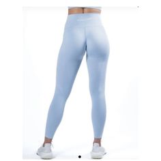 New Without Tag Light Blue Fitted Athleisure Leggings, Fitted Light Blue Athleisure Leggings, Light Blue Fitted Sports Pants, Fitted Light Blue Sports Pants, Light Blue Athletic Fit Pants For Sports, Spring Blue Compression Leggings, Blue Stretch Activewear For Spring, Light Blue Fitted Gym Bottoms, Light Blue Fitted Bottoms For Gym