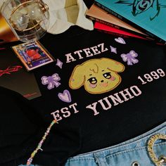 Stay warm and stylish with our Ateez Yunho inspired embroidered sweatshirt! This trendy sweatshirt is perfect for Ateez fans who want to show off their love for their favorite K-pop idol while keeping cozy and comfortable. Crafted from high-quality materials, this sweatshirt is designed to last you through the seasons. The intricate embroidery on the front of the shirt showcases Yunho's Aniteez character, adding a unique touch to your wardrobe.  The soft and warm fabric ensures that you'll stay Trendy Long Sleeve T-shirt With Embroidered Logo, Trendy Long Sleeve T-shirt With Embroidered Graphics, Kawaii Fall Sweatshirt For Streetwear, Trendy Long Sleeve T-shirt With Embroidered Text, Cute Embroidered Logo Sweatshirt For Streetwear, Kpop Style Winter Streetwear Sweatshirt, K Pop Embroidery, Harajuku Style T-shirt For Streetwear, Harajuku Style Winter T-shirt For Streetwear