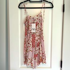 Zara Floral Print Romper. New With Tags! Zara Spring Vacation Jumpsuits And Rompers, Zara Casual Floral Print Jumpsuits And Rompers, Zara Jumpsuits And Rompers For Spring Vacation, Red Zara Jumpsuits And Rompers For Summer, White Zara Jumpsuits And Rompers For Summer, Satin Romper, Polka Dot Jumpsuit, Colorful Jumpsuit, Floral Print Rompers