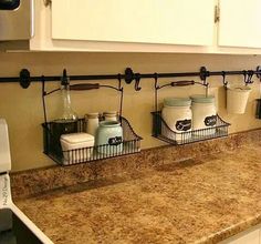 the kitchen counter is clean and ready to be used as a spice rack for spices