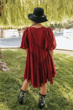 Introducing the Isabelle Asymmetrical Mini Dress in Berry - a fun and flirty addition to your wardrobe. Featuring an asymmetrical pattern, this flowy dress exudes a pretty and unique vibe. Designed in a beautiful berry red and a flattering babydoll style, it's the perfect dress for any occasion. Paired with THE CONTRAST COWBOY BOOTS IN BLACK Asymmetrical detail Puff Sleeve Button closure Mini length Lined Self 100% cotton, Lining 100% cotton Dress is true to size. Small (0-2), Medium (4-6), Larg Bohemian A-line Mini Dress With Ruffles, Chic Chiffon Dress With Asymmetrical Hem, Chic Chiffon Asymmetrical Hem Dress, Chiffon Mini Dress With Ruffle Hem And Short Sleeves, Knee-length Chiffon Mini Dress For Brunch, Short Sleeve Chiffon Mini Dress With Ruffle Hem, Trendy Spring Dresses With High-low Hem, Trendy Spring Dress With High-low Hem, Trendy A-line Dress With Ruffles