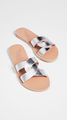 Ancient Greek Sandals Desmos Slides | SHOPBOP Silver Leather Sandals With Flat Heel, Silver Slides With Removable Insole, Elegant Open Toe Slides With Rubber Sole, Silver Open Toe Mules With Removable Insole, Silver Leather Slides For Summer, Silver Slip-on Sandals With Leather Footbed, Silver Slides With Leather Footbed For Summer, Silver Leather Sandals With Leather Footbed, Hermes Oran