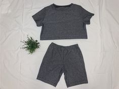 cute and comfy slightly cropped top and biker short combo Gray Athleisure Crop Top For Summer, Casual Gray Crop Top For Sports, Gray Stretch Crop Top For Loungewear, Casual Crop Top With Built-in Shorts For Sports, Casual Short Crop Top For Workout, Casual Short Crop Top For Sports, Casual Stretch Gray Biker Shorts, Sporty Gray Biker Shorts For Summer, Gray Sporty Biker Shorts For Summer