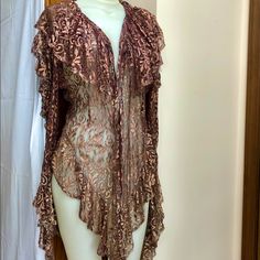 This Beautiful 1970’s/80’s Vintage Sonda Nyc Design Is Full Of Ruffles, Romance & Rock N Roll. Color Was Tough To Photograph So Please Allow A Little Leeway In How Your Screen Depicts It. I Can Best Describe It As A Coppery/Mauve/Dusty Rose Color. A Beautiful And Sophisticated Color. Made In Nyc Sonda Was A Highly Respected Clothing Designer Popular In Nyc Back In The Days Of Glam, New Romantic And Punk, And Her Pieces Are Extremely Difficult To Find. Fits Small To Medium Sizes Fitted Ruffled Cardigan For Party, Party Long Sleeve Ruffled Cardigan, Party Cardigan With Ruffles And Long Sleeves, Long Sleeve Ruffled Party Cardigan, Pink Fitted Cardigan For Party, Pink Fitted Open Front Top, Pink Open Front Fitted Tops, Nyc Design, Dusty Rose Color